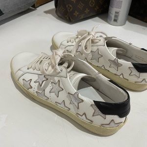 Saint Laurent white women’s star leather sneakers